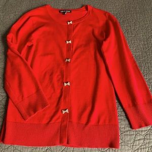 Women’s red button up sweater with crystal bow buttons size small